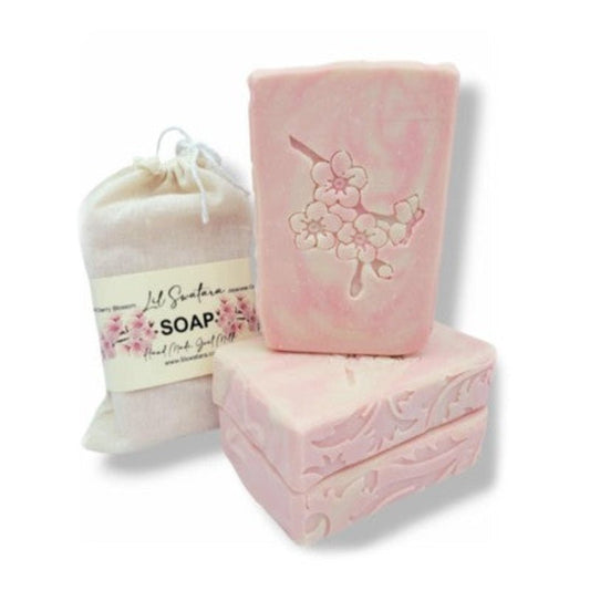 Cherry blossom and sandalwood goat milk soap bar with creamy lather and soft floral luxury, handmade for spring gifting and sensitive skin