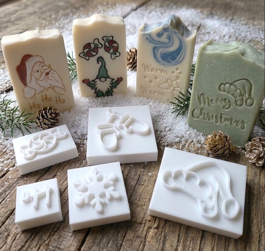Christmas soap stamp accessory set featuring peppermint candy, Santa hat, mittens, snowflake and Ho Ho Ho mini soap stamps