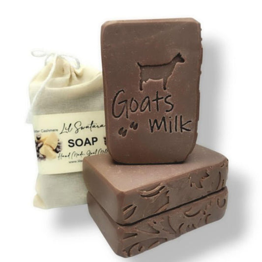Cocoa butter and cashmere goat milk soap bar with creamy lather and warm vanilla comfort, handmade for winter gifting and sensitive skin