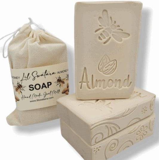 Creamy goat milk soap bar with honey, toasted almond, and oats—nourishing and comforting for sensitive skin.