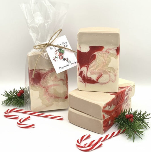 Handmade goat milk soap with crushed peppermint, sweet candy cane, and soft sugar crystals. A festive, creamy bar crafted for winter gifting, daily skin joy, and stocking stuffer magic.
