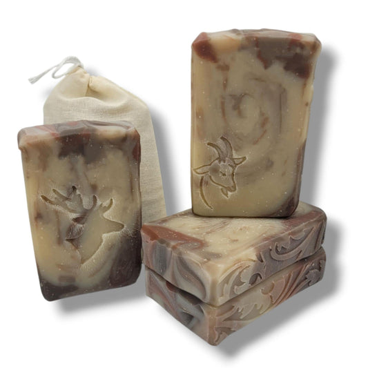 Sandalwood musk goat milk soap bar with creamy lather, bold masculine scent, and rugged forest warmth from our Ironwood Reserve collection