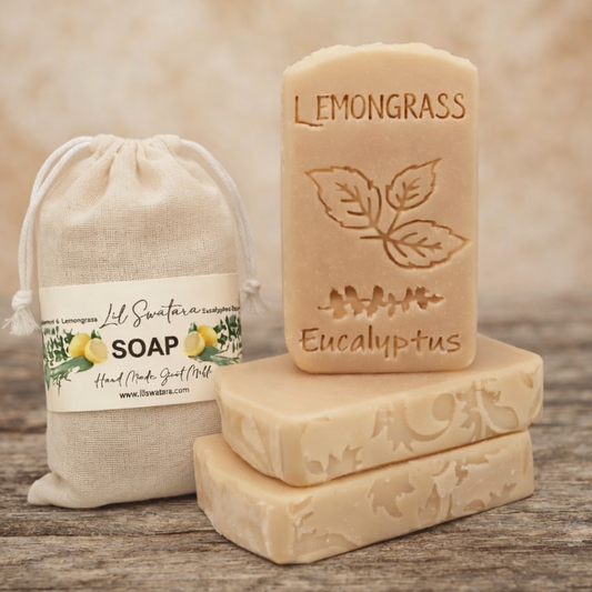 Close-up of tall handmade Euc Spear Lemongrass goat milk soap showing crisp lemongrass and eucalyptus engraving.