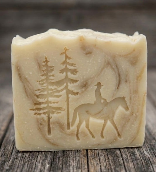 LARGE SOAP STAMP – Cowboy Horse Pines Western Design Creates LARGE, crisp impressions featuring a cowboy on horseback framed by rugged pine trees, perfect for western soaps, ranch themed artisan batches, country market collections, and outdoor inspired seasonal bars.