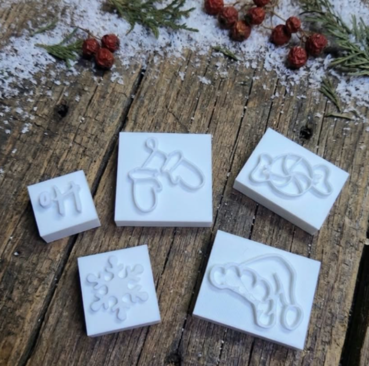 Christmas soap stamp accessory set featuring peppermint candy, Santa hat, mittens, snowflake and Ho Ho Ho mini soap stamps