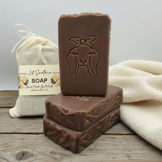 Cocoa butter and cashmere goat milk soap bar with creamy lather and warm vanilla comfort, handmade for winter gifting and sensitive skin