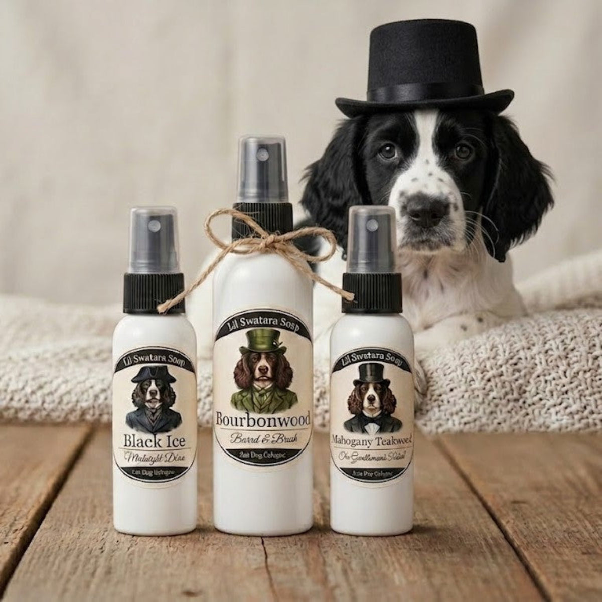 Three Gentleman’s Collection dog freshening sprays displayed with a Springer Spaniel in a top hat behind them, Lil Swatara Soap branding.