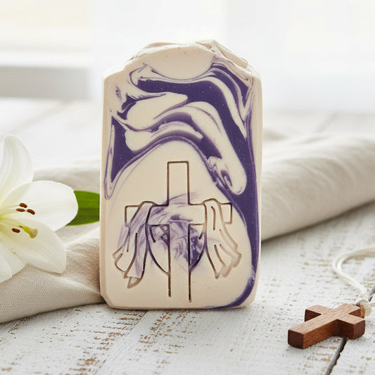 Handmade soap bar stamped with He Is Risen cross design, showing crisp XL impression from 3D printed soap stamp.