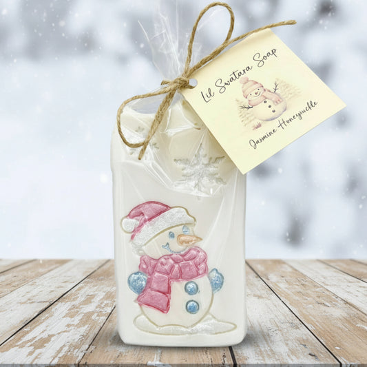 Snowman-themed soap in clear packaging with a tag on a white background Jasmine Honeysuckle goat milk soap