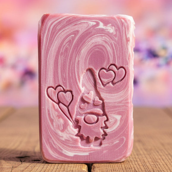 LARGE SOAP STAMP – Gnome Hearts Valentine Design creates LARGE, crisp impressions featuring a valentine gnome holding hearts, perfect for romantic, seasonal, and birthday handmade soaps.
