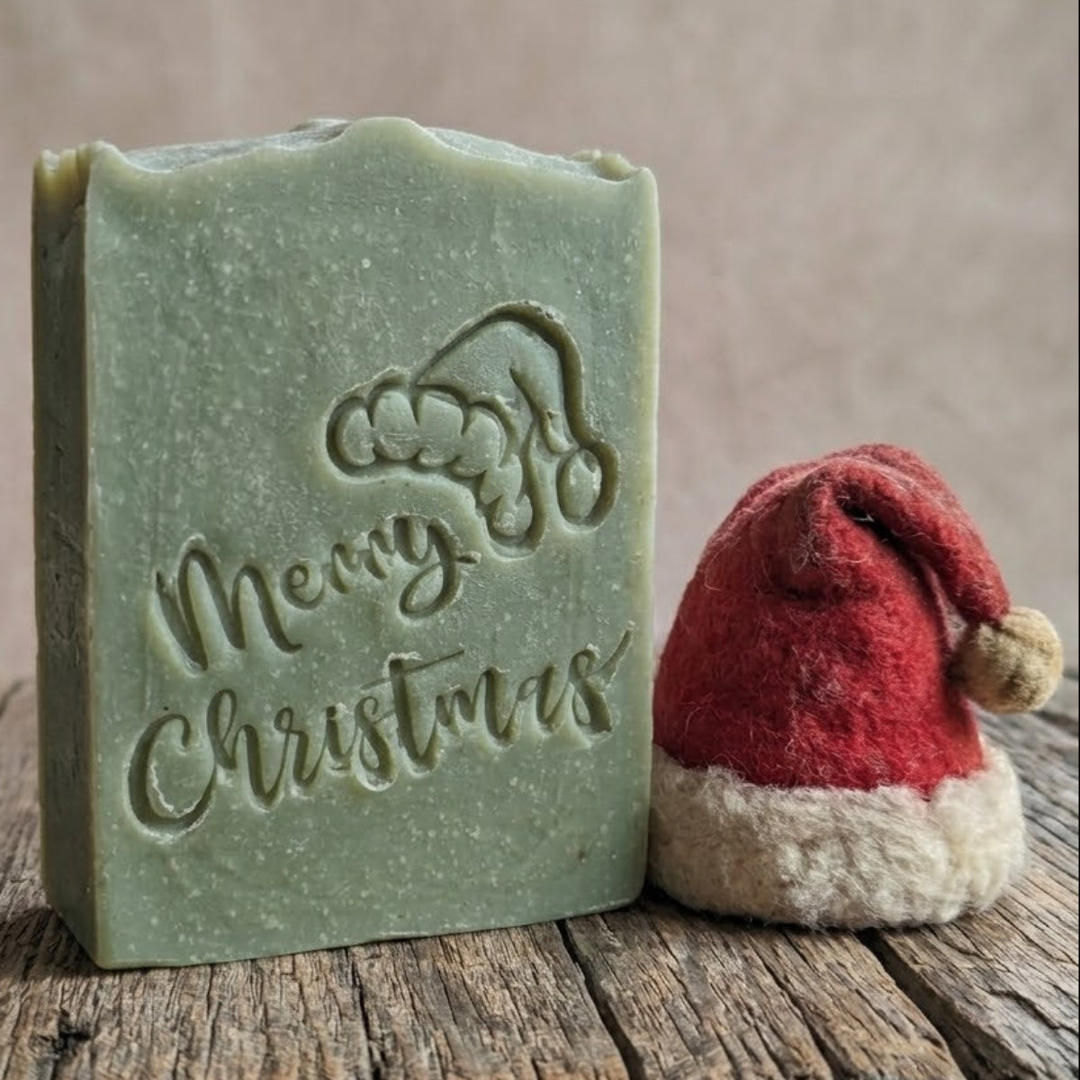 LARGE SOAP STAMP – Merry Christmas Words & Santa Hat Design creates LARGE, crisp impressions featuring festive Christmas lettering and Santa’s hat, perfect for holiday and winter handmade soaps.

