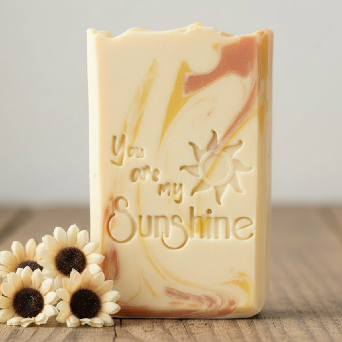 LARGE SOAP STAMP – You Are My Sunshine Sun Design creates LARGE, crisp impressions featuring a sun with sunshine rays and cheerful lettering, perfect for joyful and inspirational handmade soaps.

