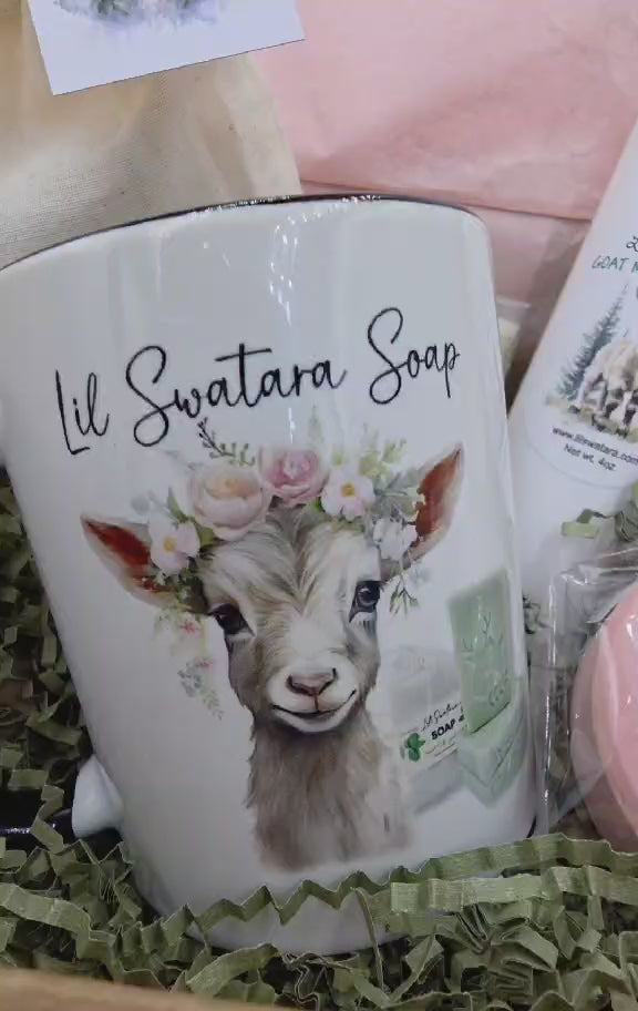 Lil Swatara goat mug gift set with lotion, soap puck, lip balm, and samples in a crinkle paper box. Movie