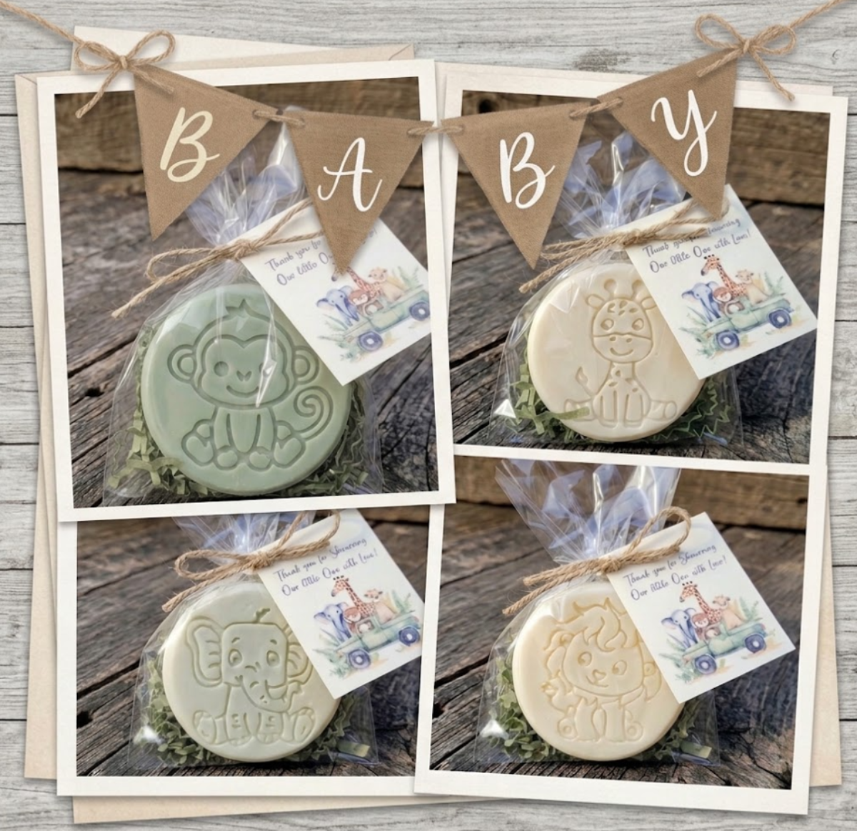 set of four jungle safari animal favor soaps (monkey, elephant, giraffe, lion) individually packaged in clear bags with jute twine and baby shower gift tags, arranged in a row on a rustic wooden background.