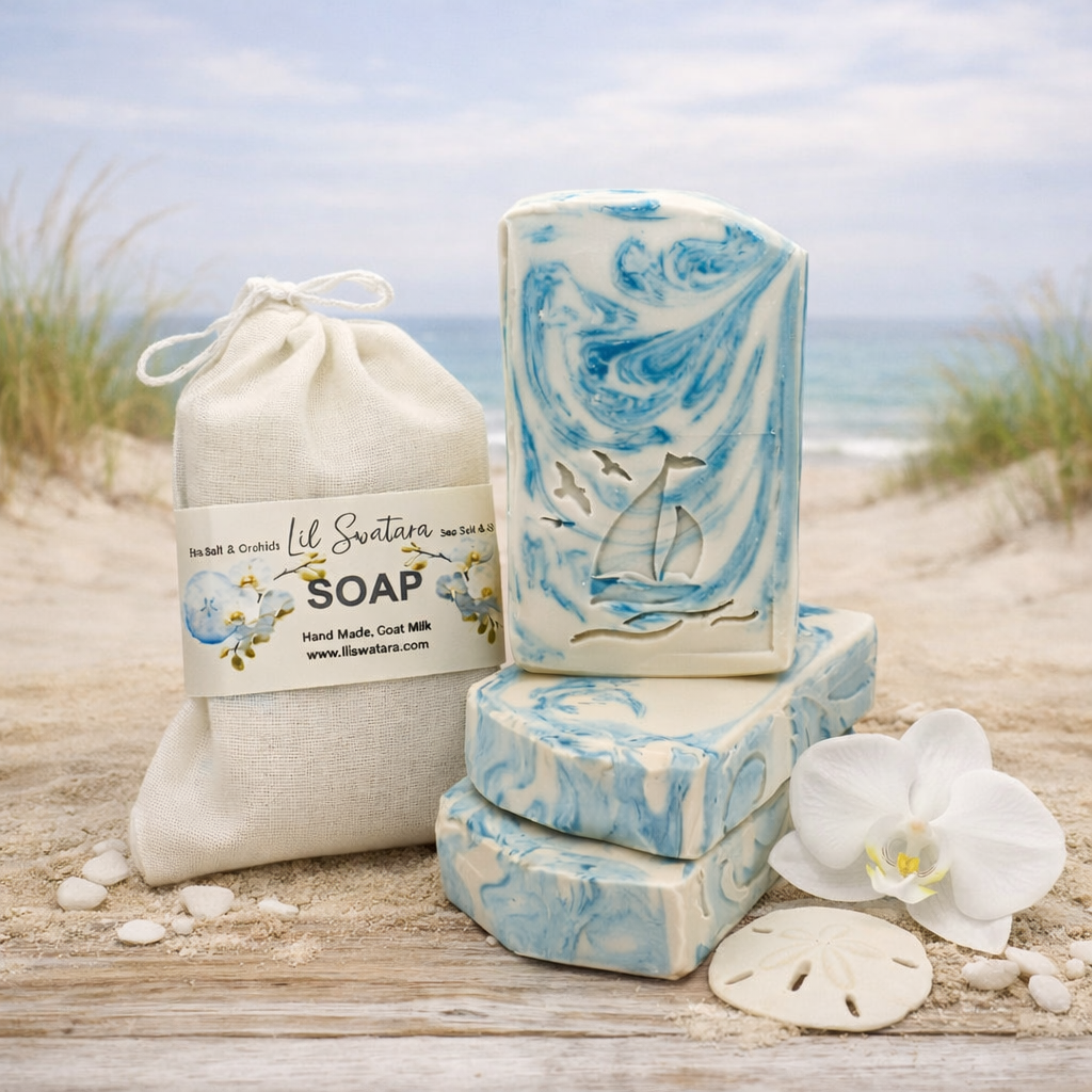 Sea Salt & Orchid tallow goat milk soap with creamy white base and teal swirls, sailboat stamp, orchid flower, and sand dollars on soft coastal beach with dunes and pale sky.