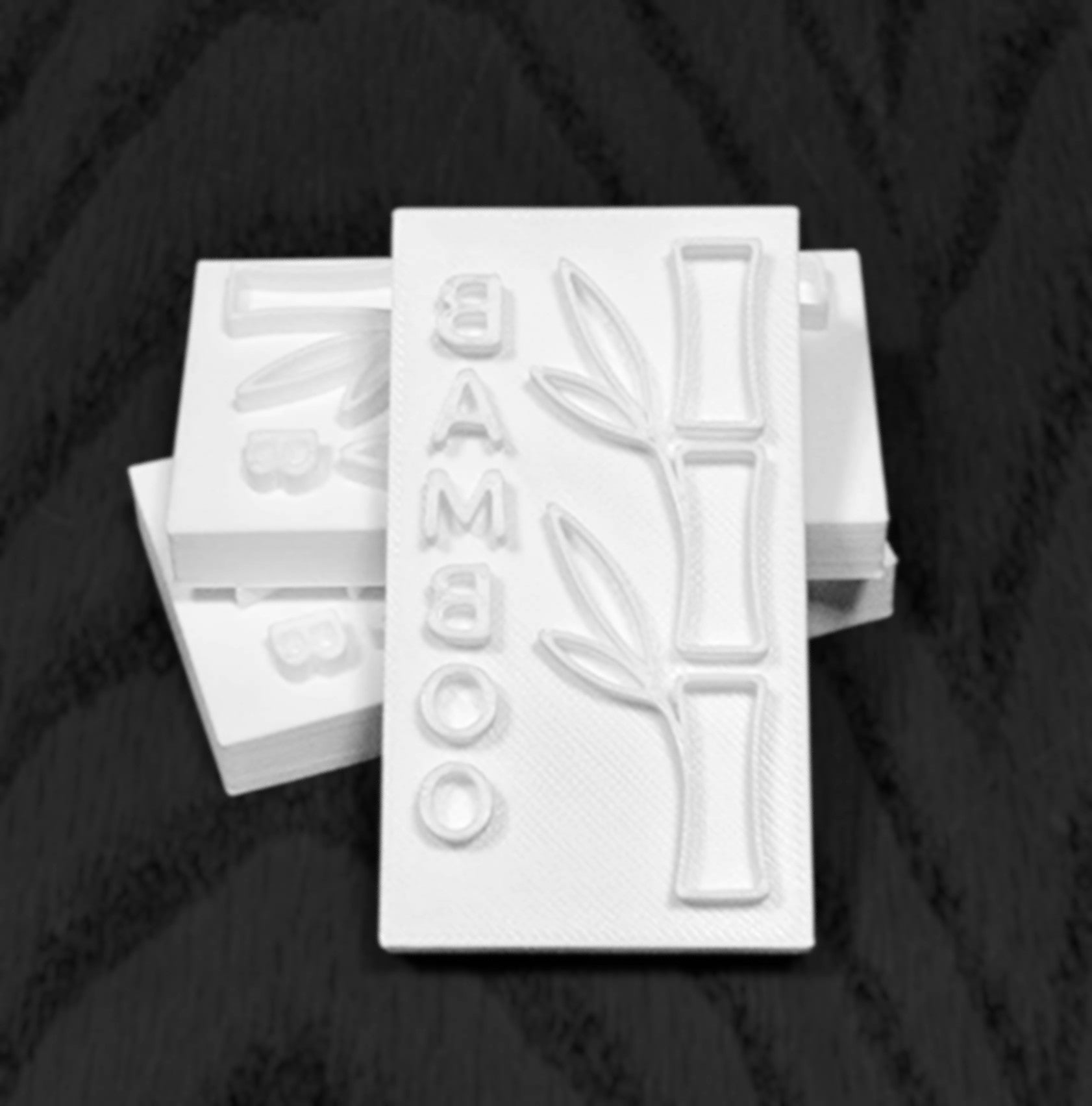 Bamboo soap stamp with vertical BAMBOO word and bamboo stalks, 60×31 mm, fully 3D printed base
