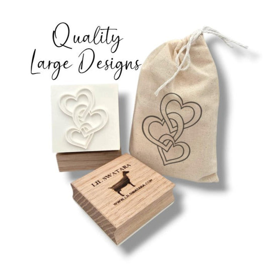 Wooden soap stamp with three interlocking hearts design, perfect for romantic and love-themed handmade soaps.