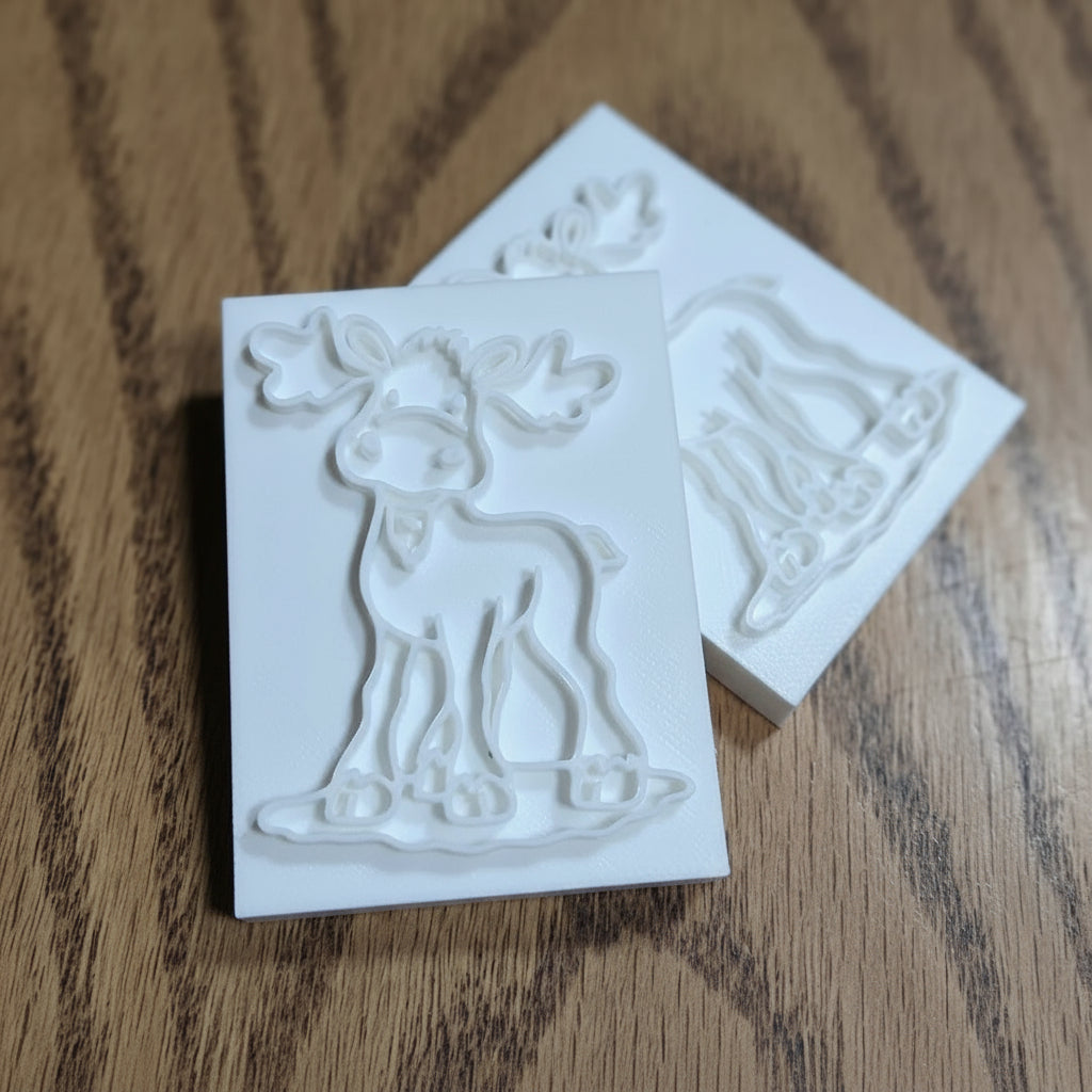 Cute moose soap stamp with gentle antlers, 3D printed in high-detail PLA for crisp impressions on handmade goat milk bars — cozy, woodland charm in a 60×45mm format