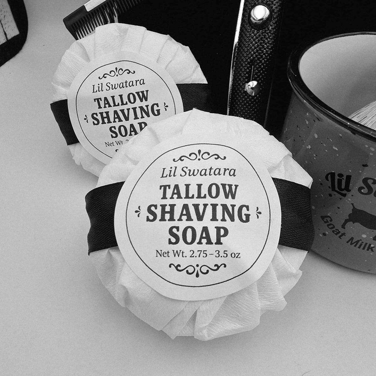 Creamy goat milk and tallow shave soap with spearmint. Includes discs, mug, and brush. Handmade, razor-friendly, and gift-ready. natural