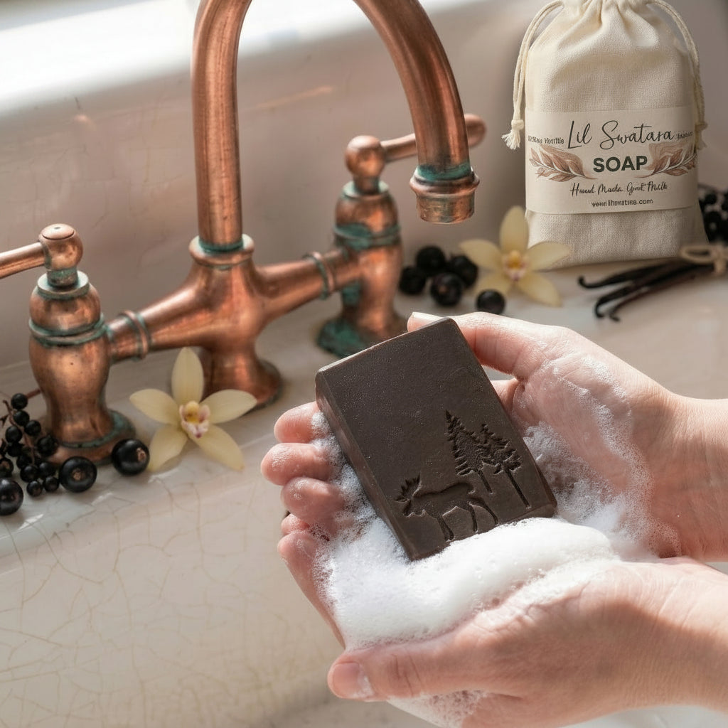 Person washing hands with Lil Swatara Tobacco Vanilla goat milk soap in an old vintage clawfoot bath filled with warm suds, evoking a cozy, nostalgic farmhouse atmosphere.