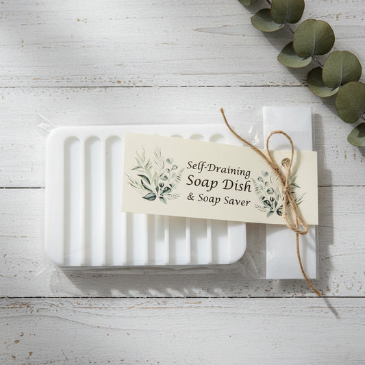 Self-draining soap dish with a label and decorative string on a white background
